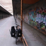 Bike path under a bridge: Le cool Graffiti